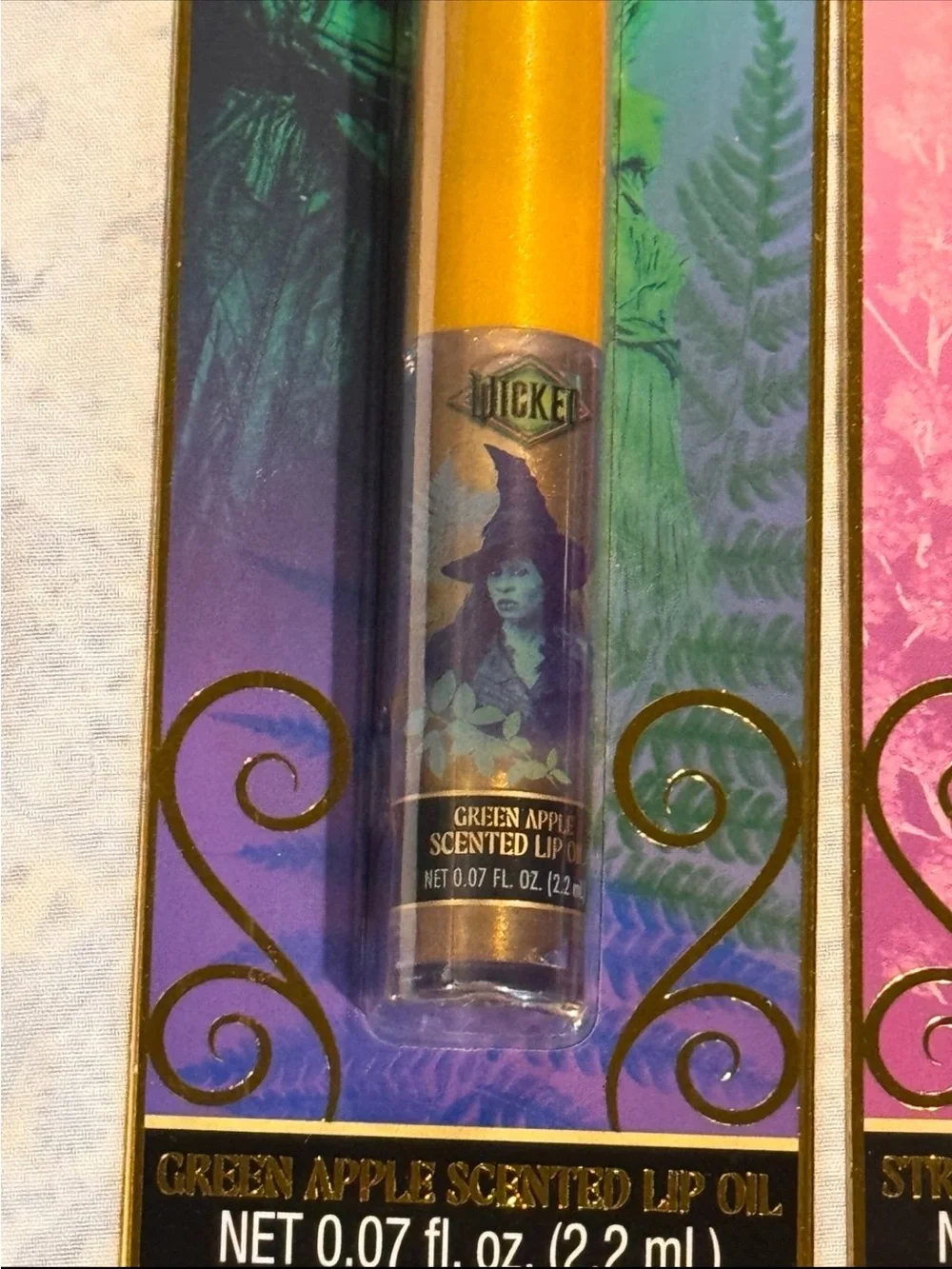 Wicked Scented Lip Oil Duo – Elphaba Green Apple & Glinda Strawberry